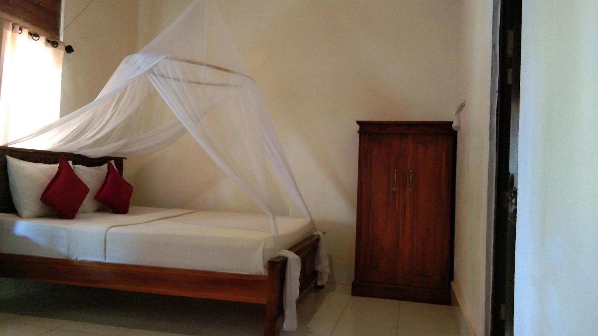 Timbool Bungalow Ped Kamer foto