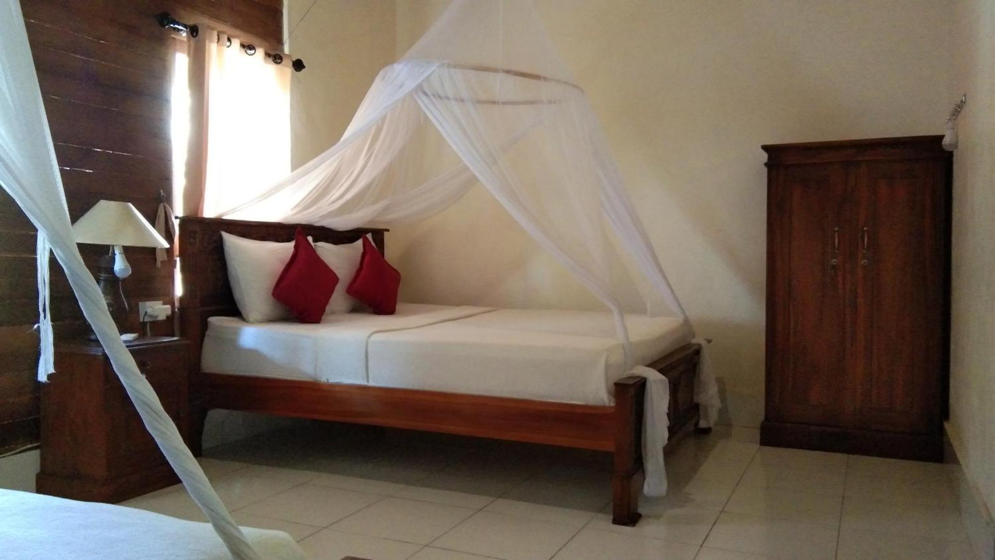 Timbool Bungalow Ped Kamer foto
